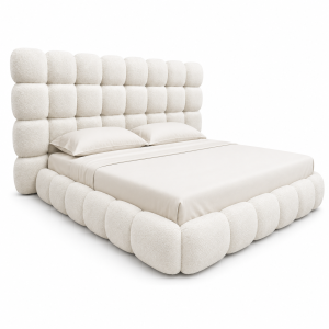 Luxury Mire upholstered bed with oversized padded headboard and rounded contemporary cream frame in a modern bedroom.